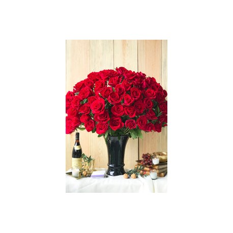 Constanza, 100 rosas rojas de en arreglo floral