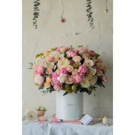 Lucrecia, espectacular arreglo con peonias